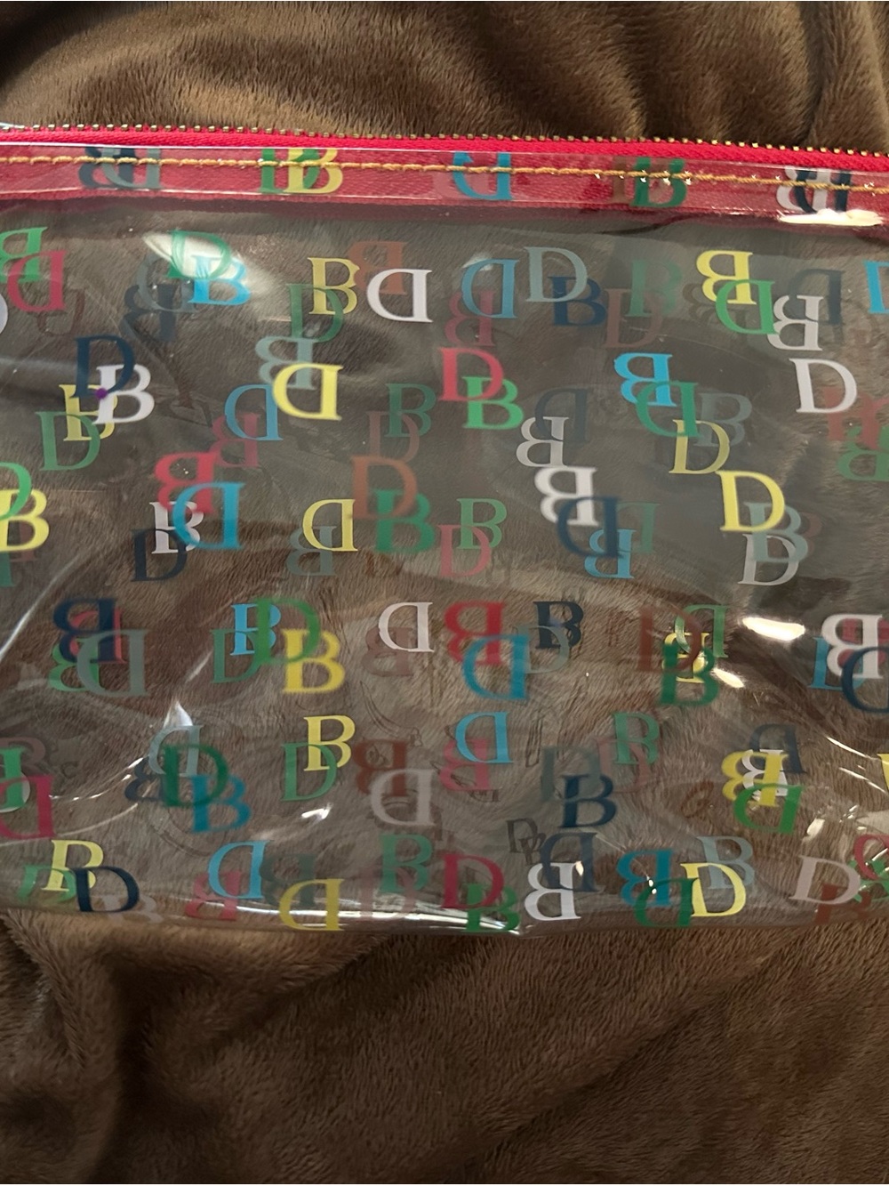 Dooney & Bourke Clear Cosmetic Case with Multicolor DB Print and Red Trim